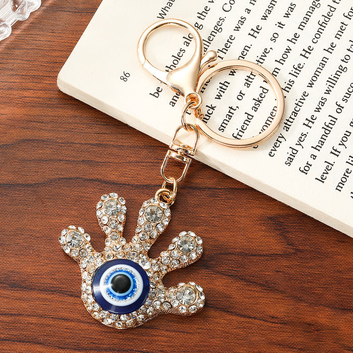 Wholesale Turkish Evil Eye Palm Keychain Zinc Alloy White Bag Charm Resale