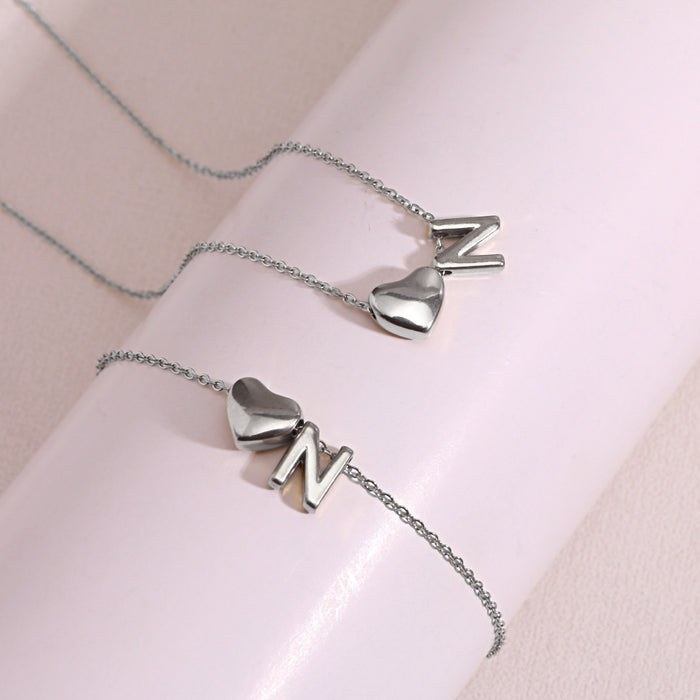 Wholesale Clavicle chain jewelry accessory 26 letter heart pendant titanium steel necklace