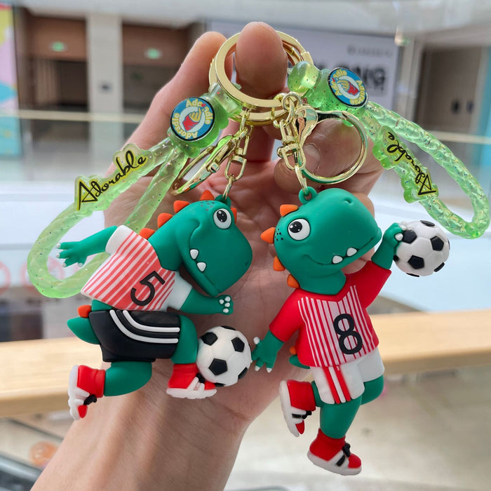 Wholesale Creative new football dinosaur keychain, exquisite and cute soft plastic figurine pendant, bag accessories, small gifts