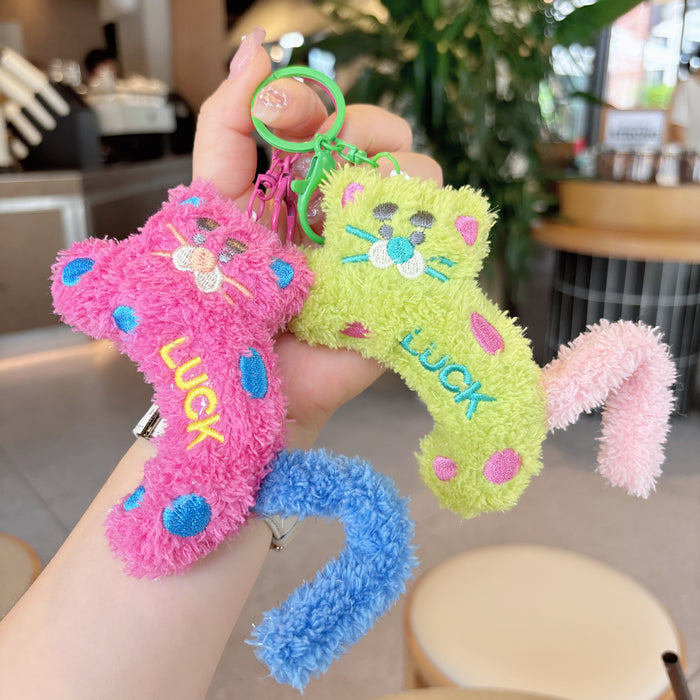 Wholesale Creative cartoon polka dot leopard doll keychain DIY twist tail decompression doll student pendant