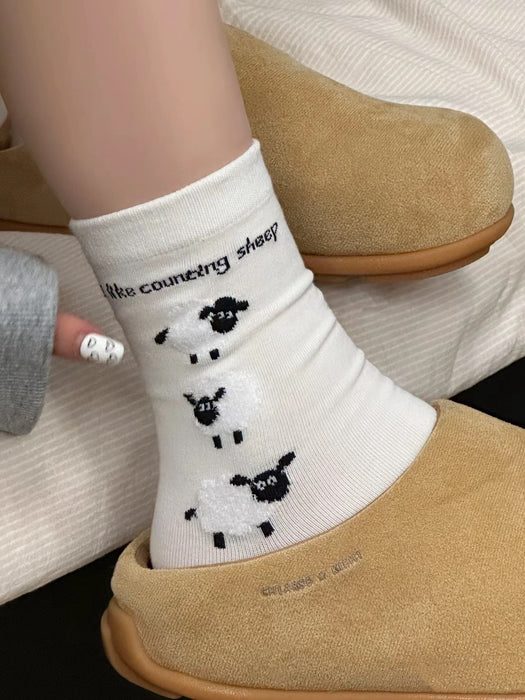 Wholesale Illustration trend cute pile socks cotton socks new product cartoon flocking mid tube socks