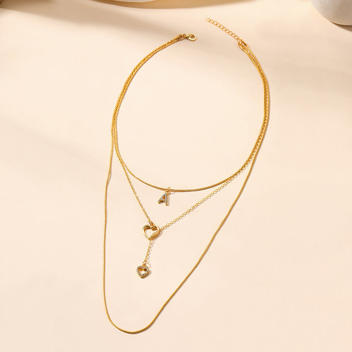 Wholesale Versatile jewelry, letter necklace, alloy heart tassel, three-layer necklace