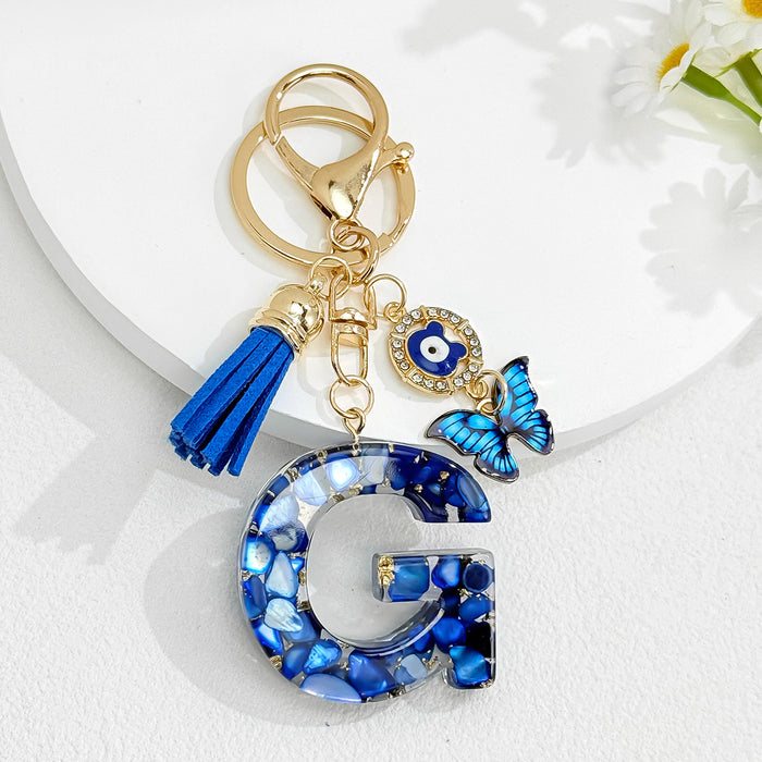 Wholesale Royal Blue 26 Letter Keychain with Evil Eye Butterfly Tassel Pendant