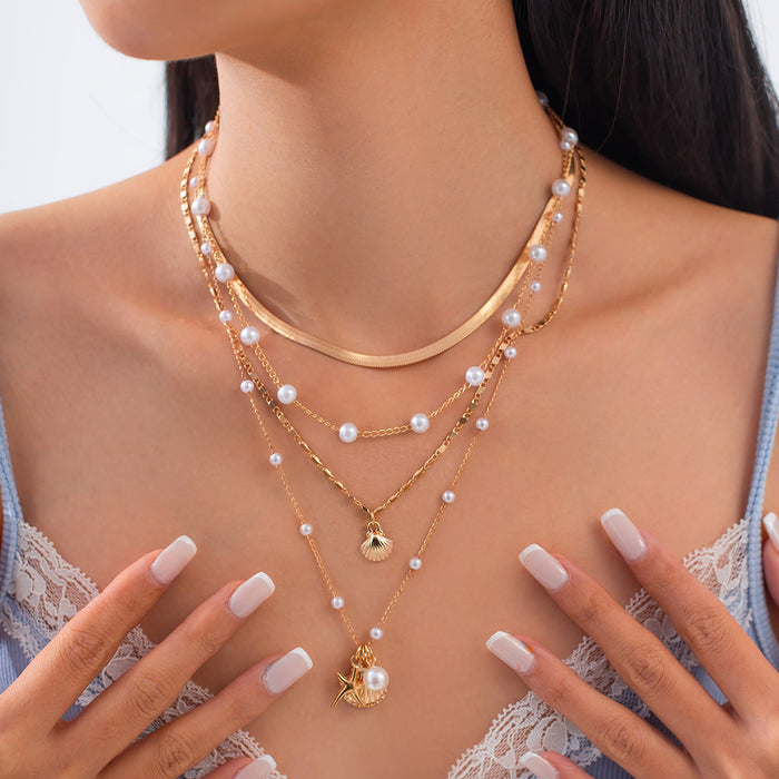 Wholesale Multi layer imitation pearl necklace set retro bead collarbone chain shell pendant