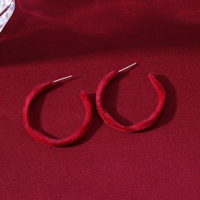 Wholesale Minimally designed wave shaped large earrings with a high-end feel and temperament. New niche white retro velvet earrings