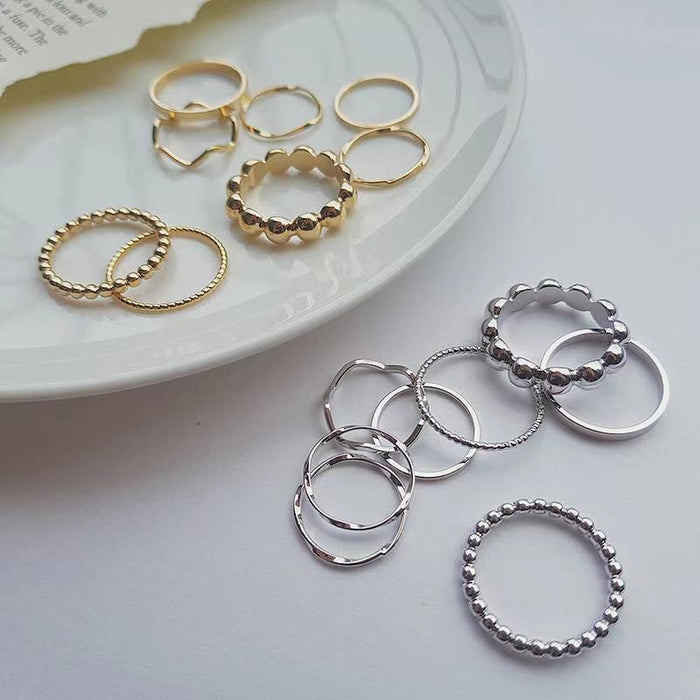 Wholesale Set of simple and personalized 8-piece ring with a plain circle and stacked rings
