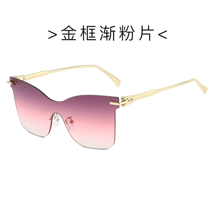 Wholesale Frameless one-piece sunglasses with a high-end feel, personalized trendy glasses, UV resistant cat eye retro sunglasses