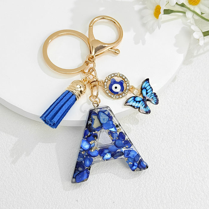 Wholesale Royal Blue 26 Letter Keychain with Evil Eye Butterfly Tassel Pendant