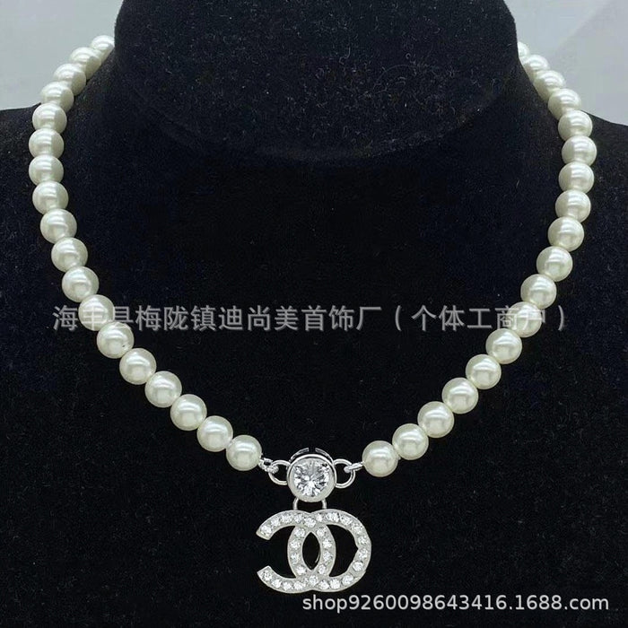 Wholesale Double C letter enamel camellia pearl long necklace