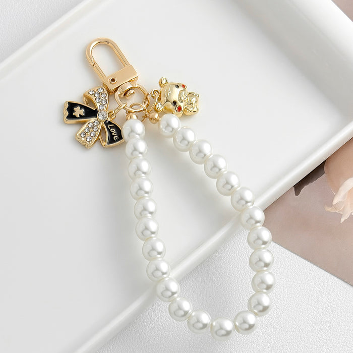Wholesale Pearl chain beaded mobile phone lanyard bow pendant keychain