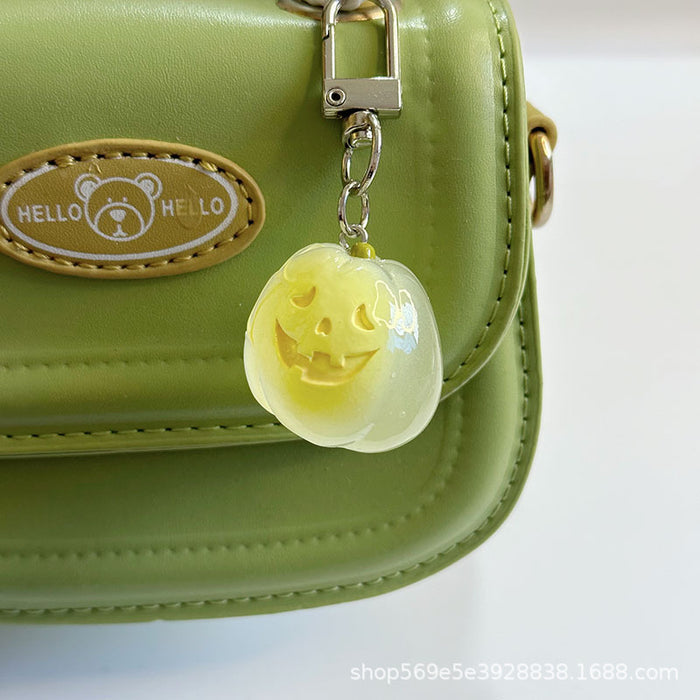 Wholesale Novelty  Pumpkin Pendant Keychain Glow In The Dark Resin Black Hat Design Bag And Earphone Case Charm Gift For Students And Couples