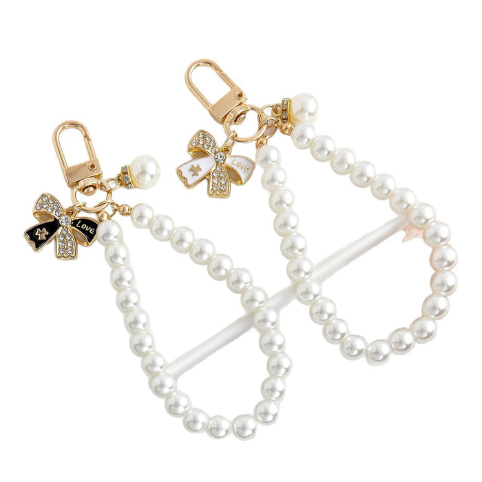 Wholesale Pearl chain beaded mobile phone lanyard bow pendant keychain