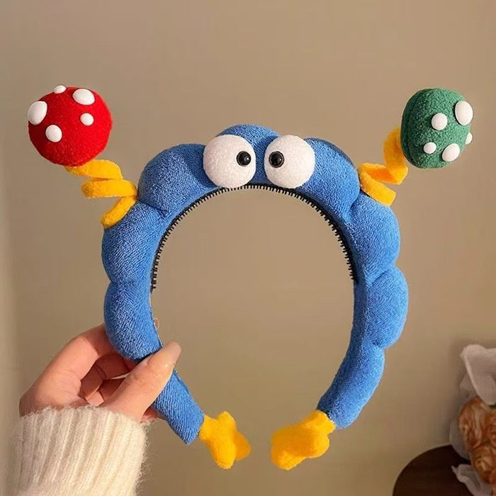 Wholesale Cute girl' s twistable hairband with big-eyed plush toy design.