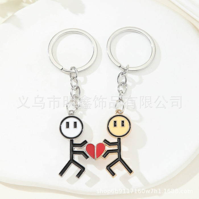 Wholesale Stick figure couple funny magnetic heart splicing keychain