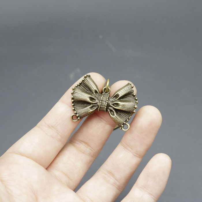 Wholesale Iron Alloy Simple Bow Keychain JDC-KC-HEMS003