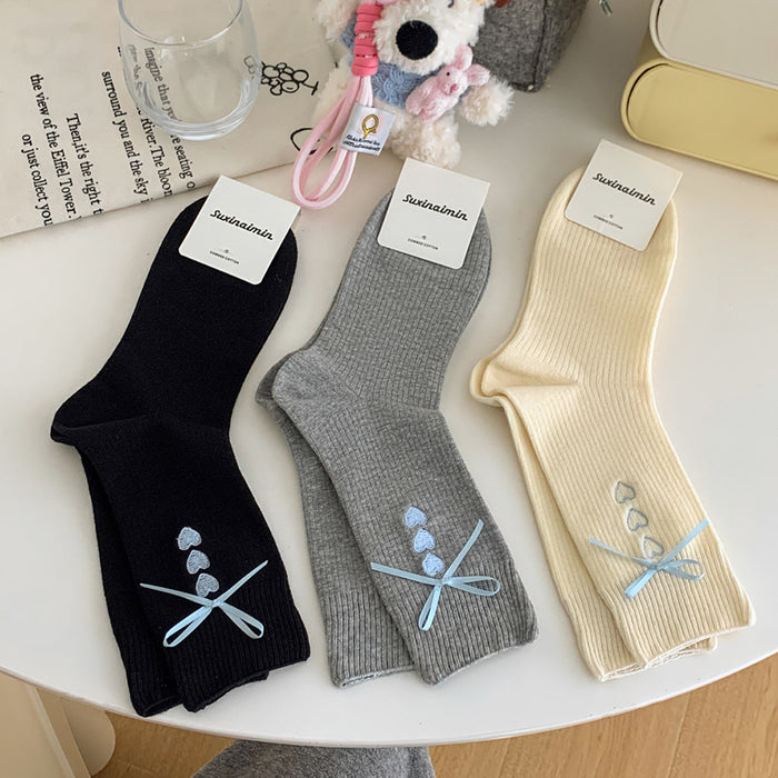 Wholesale Embroidered heart-shaped tube socks with blue ribbon and bow, stacked socks