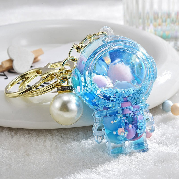 Wholesale Acrylic oil bottle candy Bean astronaut keychain