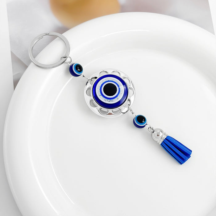 Wholesale Diamond-encrusted blue eyes evil eye tassel keychain