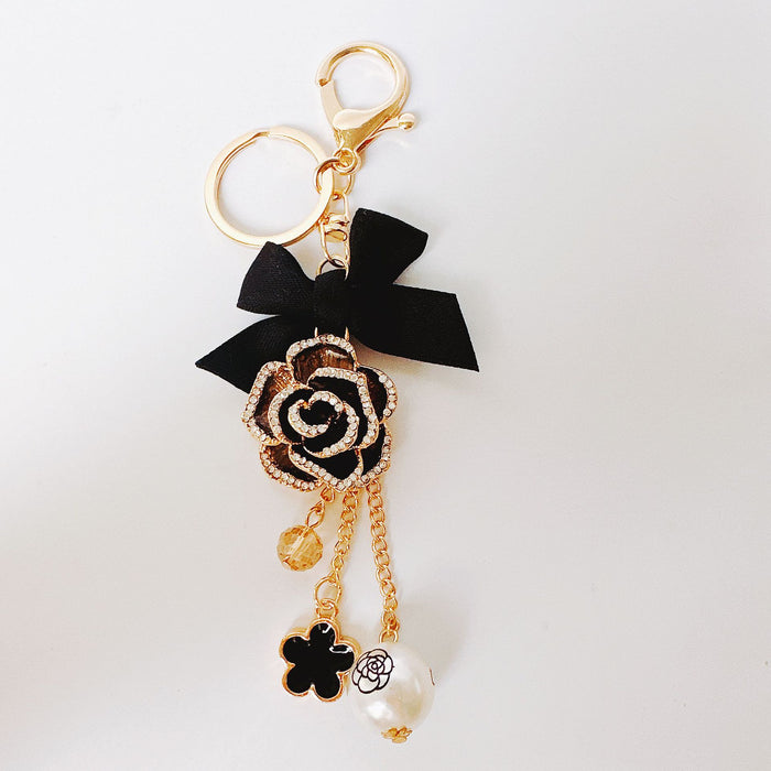 Wholesale Rhinestone Bow Pearl Tassel Camellia Zinc Alloy Keychain JDC-KC-ZhanLun014