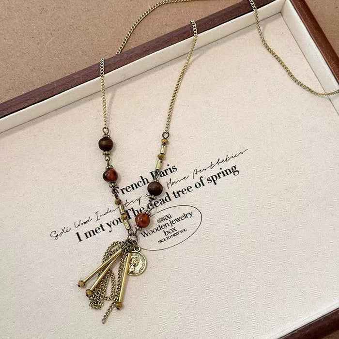 Wholesale Vintage coins, tassels, bead necklaces, sweater chains, stacked black necklaces, accessories