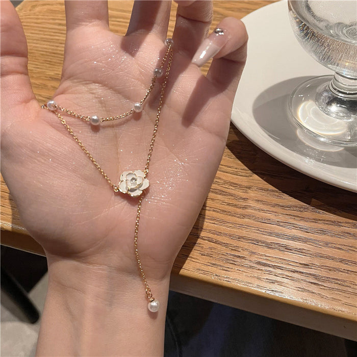 Wholesale Double layered tassel pearl necklace with niche design, collarbone chain, light luxury, temperament, neck chain