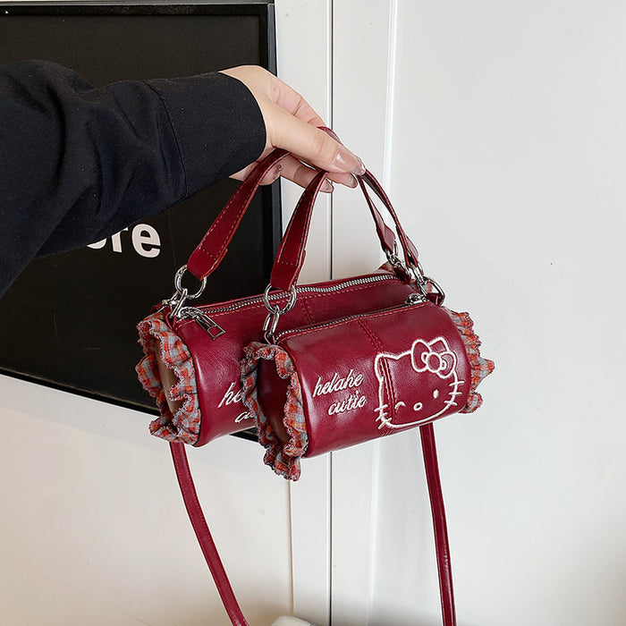 Wholesale Cute cartoon embroidered shoulder bags with a handle.