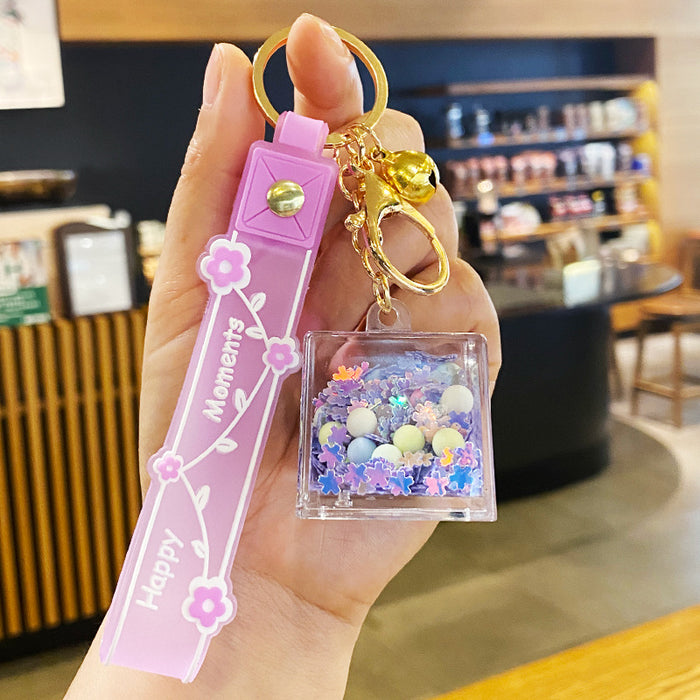 Wholesale Oil-flowing Quicksand Sakura Keychain