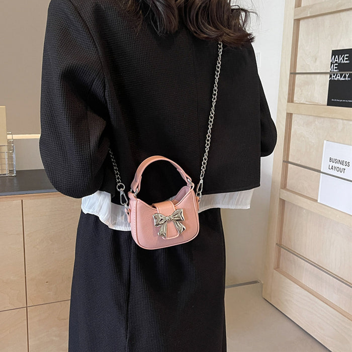 Wholesale New retro oil leather handbag with shiny bow and chain crossbody bag