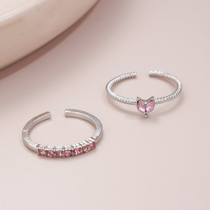 Wholesale Set of open-faced diamond-encrusted heart-shaped rings.