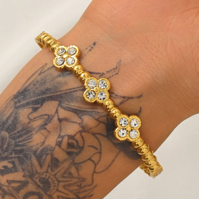 Wholesale Women S Titanium Steel Bracelet Featuring Three Flowers Four Leaf Clover With Electroplated Finish For Everyday Fashion Accessory