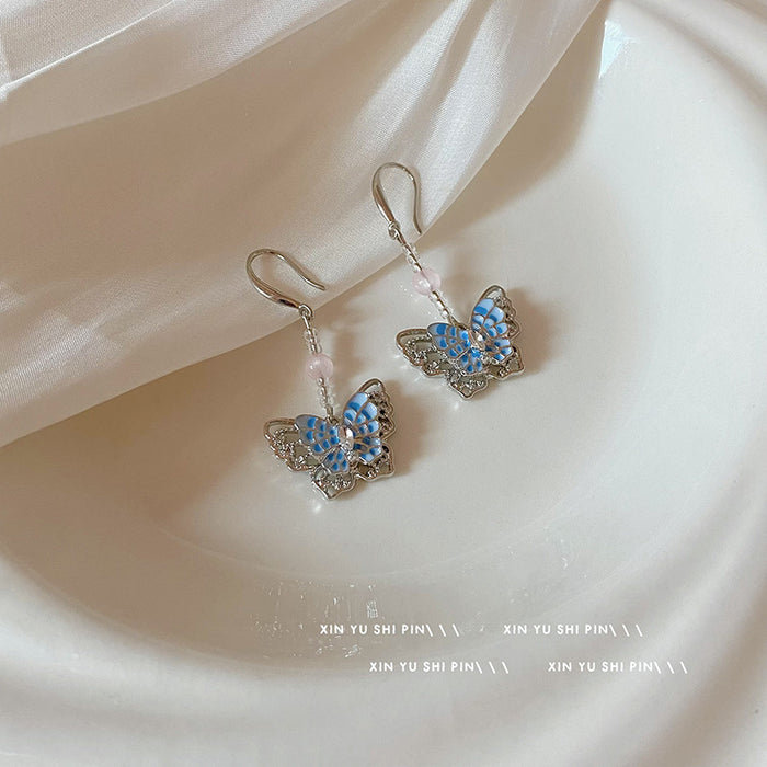 Wholesale Blue butterfly tassel earrings, new style, light luxury, western-style, versatile and personalized earrings