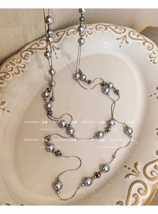 Wholesale Long pearl necklace, niche, light luxury, high-end, fashionable, versatile, layered sweater chain