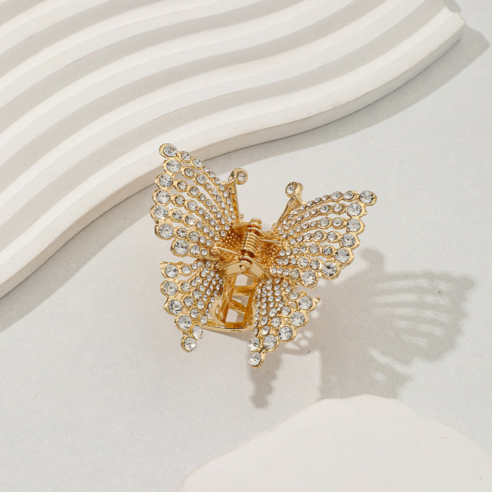 Wholesale Alloy butterfly hair clip, small size, grab clip, feminine temperament, semi tied hair accessory, new style, back of the head grab clip hair accessory