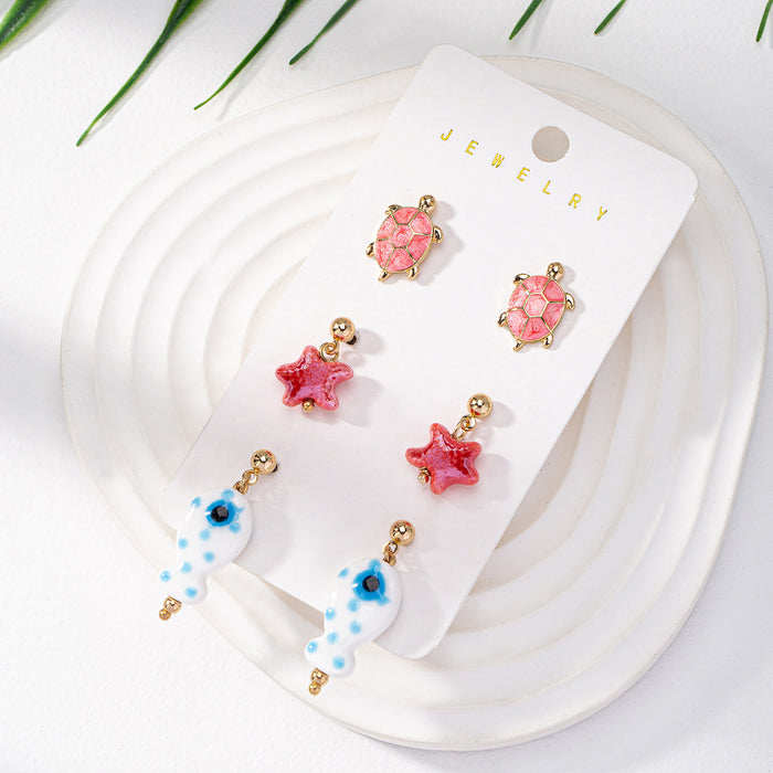 Wholesale Qingdao Daiwei European and American Ins Popular Jewelry Cross-Border E-Commerce Supply 3 Pairs of Shell Starfish Ceramic Fish Earrings Set