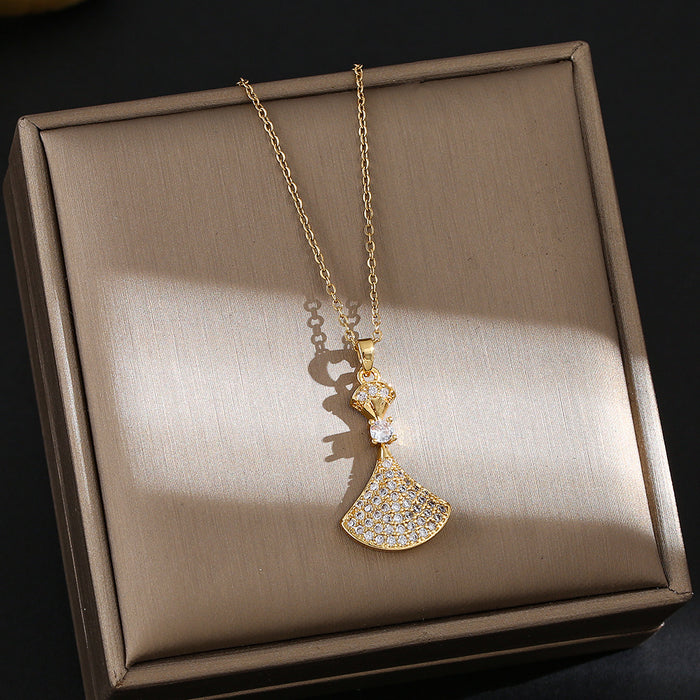 Wholesale Titanium steel necklace with a small dress pendant encrusted with rhinestones.