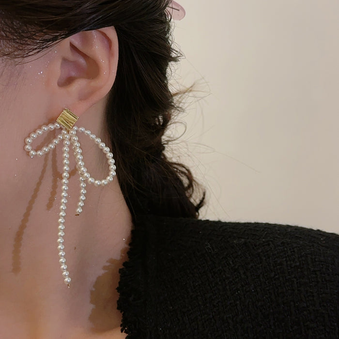 Wholesale Pearl temperament long tassel earrings, niche design, high-end long tassel ear clip