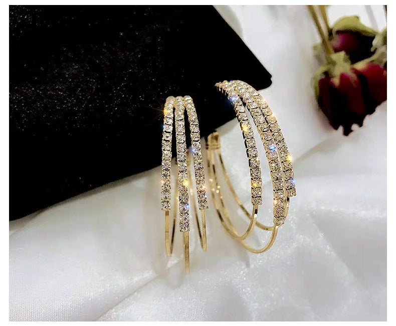 Wholesale Full diamond round exaggerated gold edged earrings