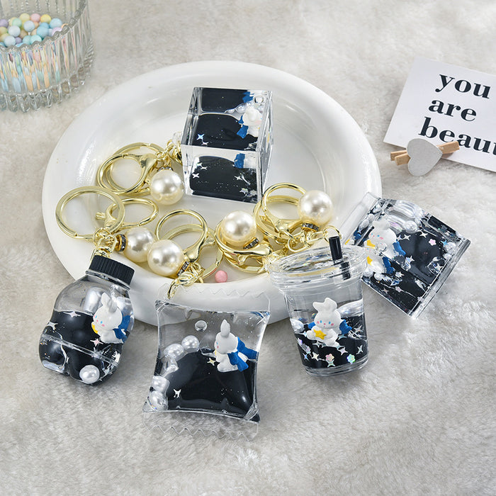 Wholesale Black and gold glitter bottle milk tea cup oil-filled acrylic keychain