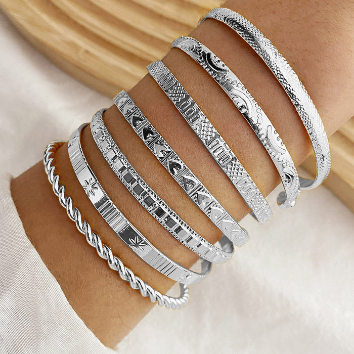 Wholesale 7-piece set of arrow-shaped diamond pattern hexagonal twisted open bracelet