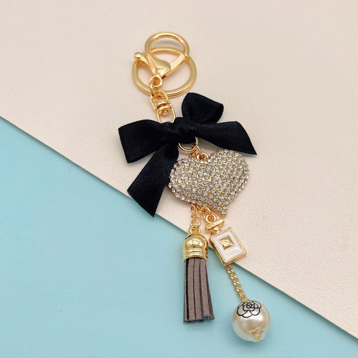 Wholesale Bow Perfume Bottle Tassel Rhinestone Heart Zinc Alloy Keychain JDC-KC-ZhanLun009