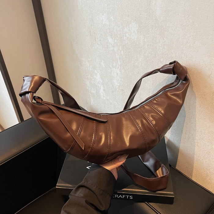 Wholesale Folded design crescent crossbody bag with large capacity soft leather retro temperament, layered shoulder bag