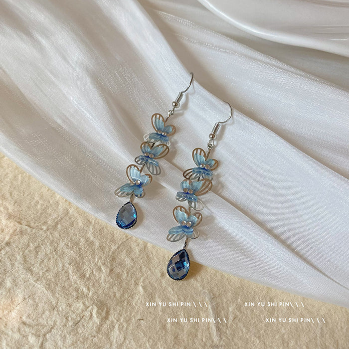 Wholesale Butterfly droplet pendant earrings with niche design, light luxury temperament, fashionable long tassel earrings