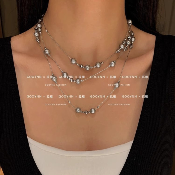 Wholesale Long pearl necklace, niche, light luxury, high-end, fashionable, versatile, layered sweater chain