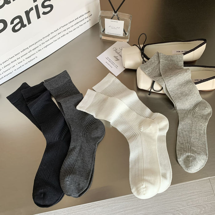 Wholesale Boneless vertical black and white mid tube socks, anti pilling and breathable