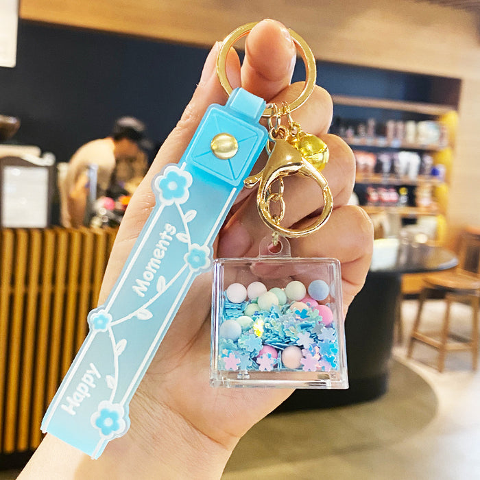Wholesale Oil-flowing Quicksand Sakura Keychain