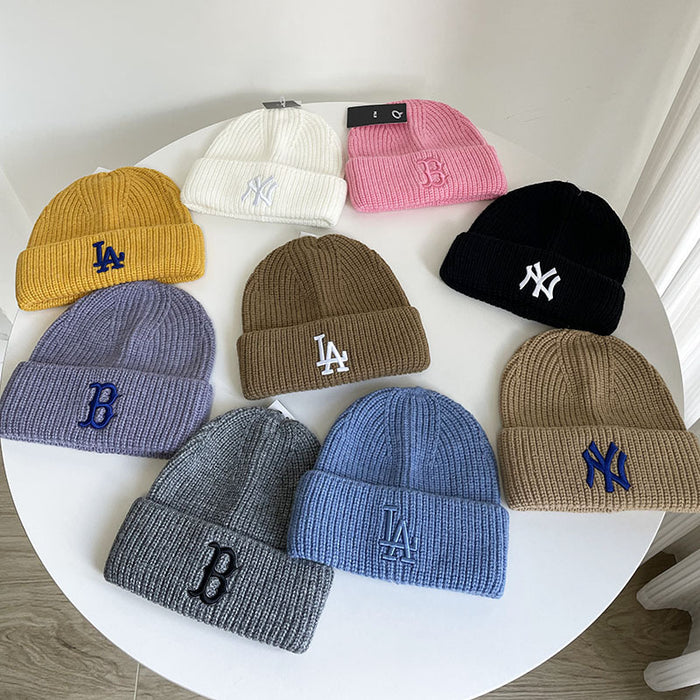 Wholesale autumn and winter cold-proof warm letter embroidered knitted hat ear protection hat JDC-HT-MaiM001