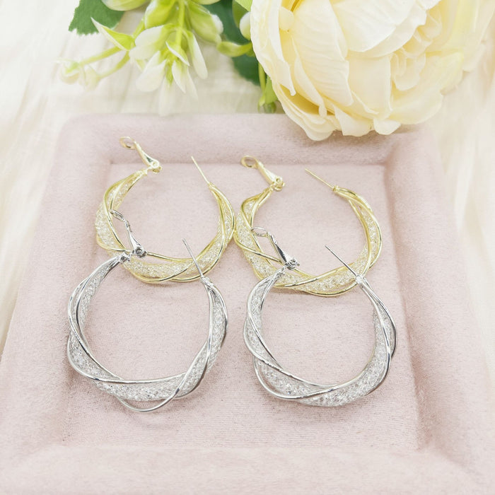 Wholesale Retro style fashion temperament hollow mesh earrings with niche design, light luxury, atmosphere, high-end sense, fashionable earrings