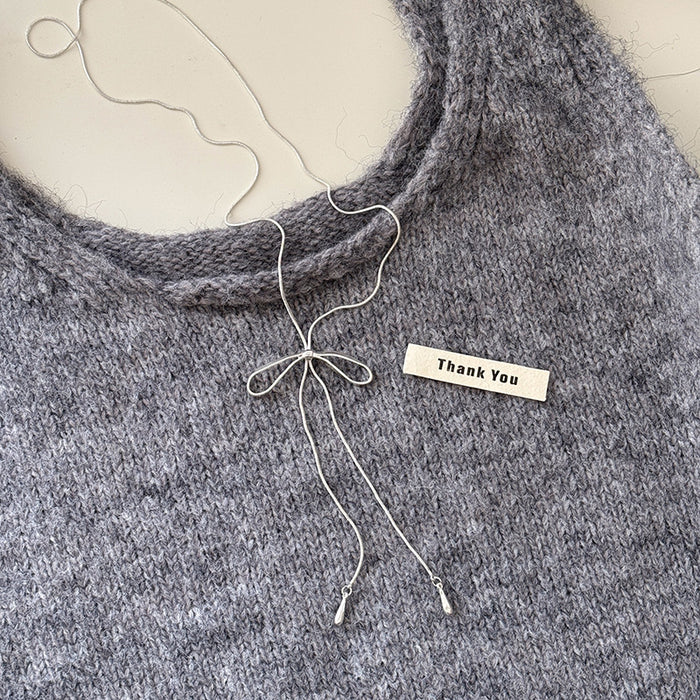 Wholesale Pearl sweater chain with high-end feel, long double layered layered titanium steel necklace, niche light luxury accessory