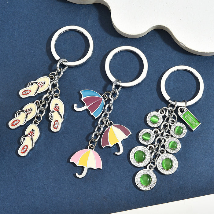 Wholesale Trendy Multi Pendant Aluminum Alloy Keychain Beach Vacation Cute Cartoon Theme Bag Charm