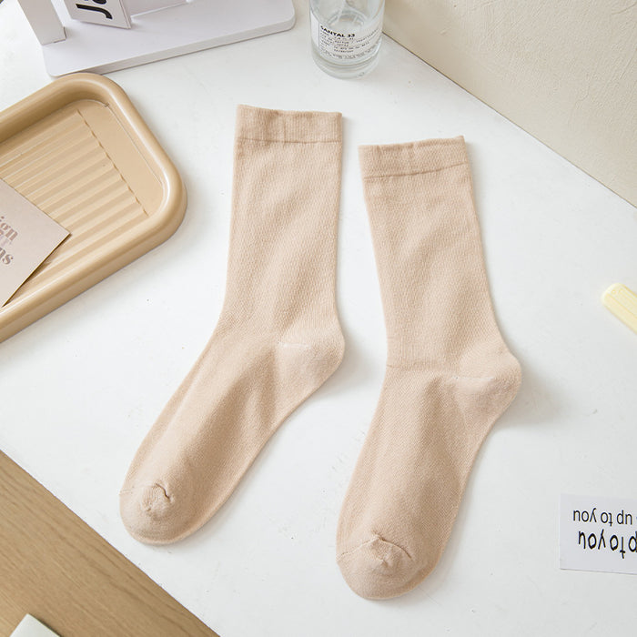 Wholesale White mid length socks made of pure cotton, high cut, and elastic, long socks that absorb sweat and pile up socks